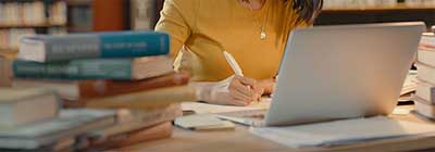 Woman taking notes on a notepad